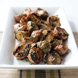 Grilled Potatoes with Garlic and Rosemary on a Charcoal Grill